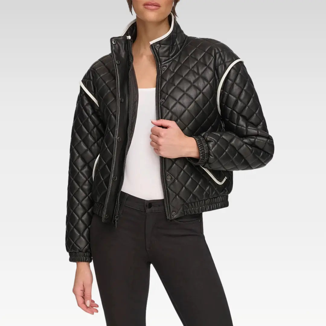 Front view of Alia Black Quilted Bomber Leather Jacket featuring zip-and-snap closure, stand collar, and quilted leather texture.