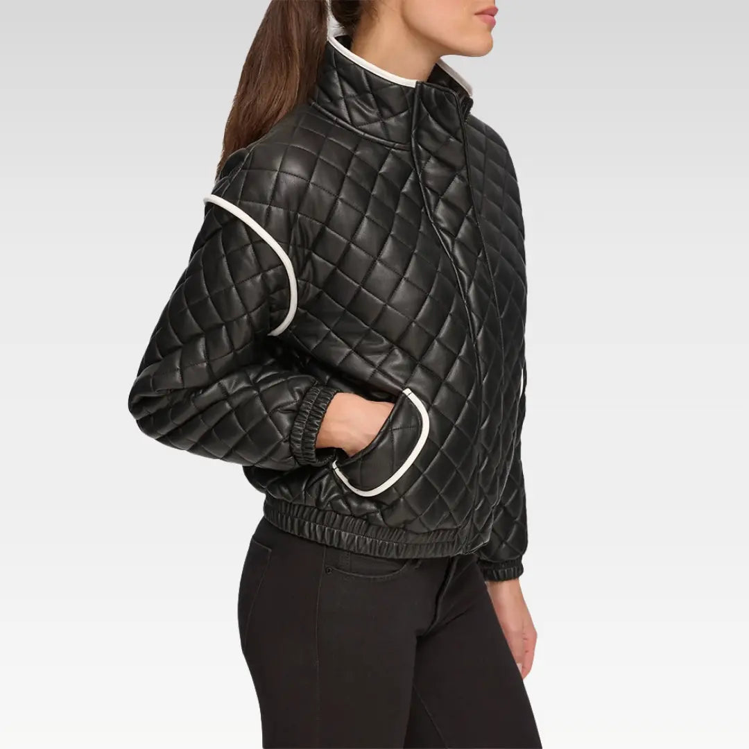 Side view of Alia Black Quilted Bomber Leather Jacket highlighting functional pocket, sleek stitching, and fitted silhouette.
