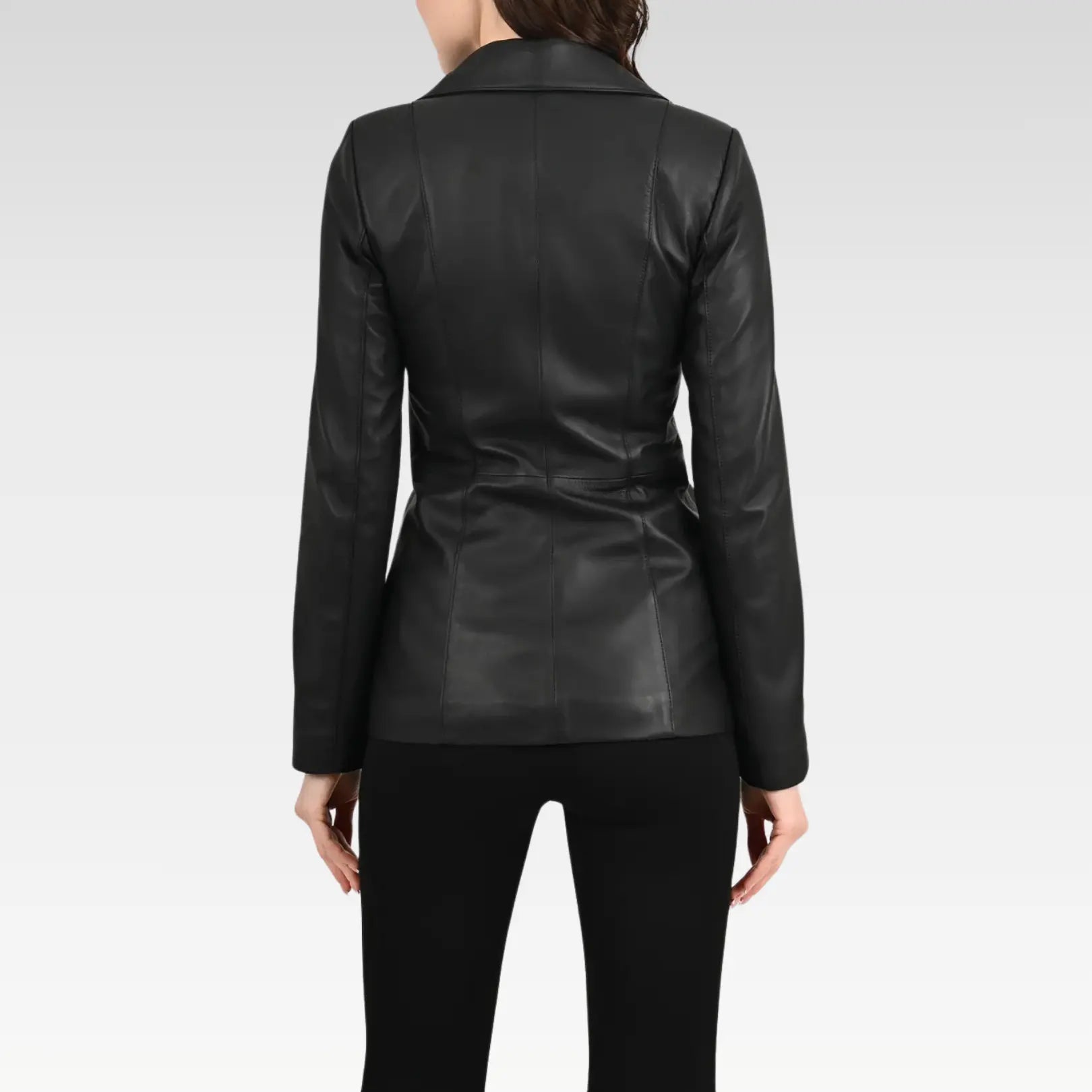 An alternate front view of the Brienne Casual Women's Black Leather Blazer, featuring its versatile styling options with a white top and gray pants, ideal for professional polish.