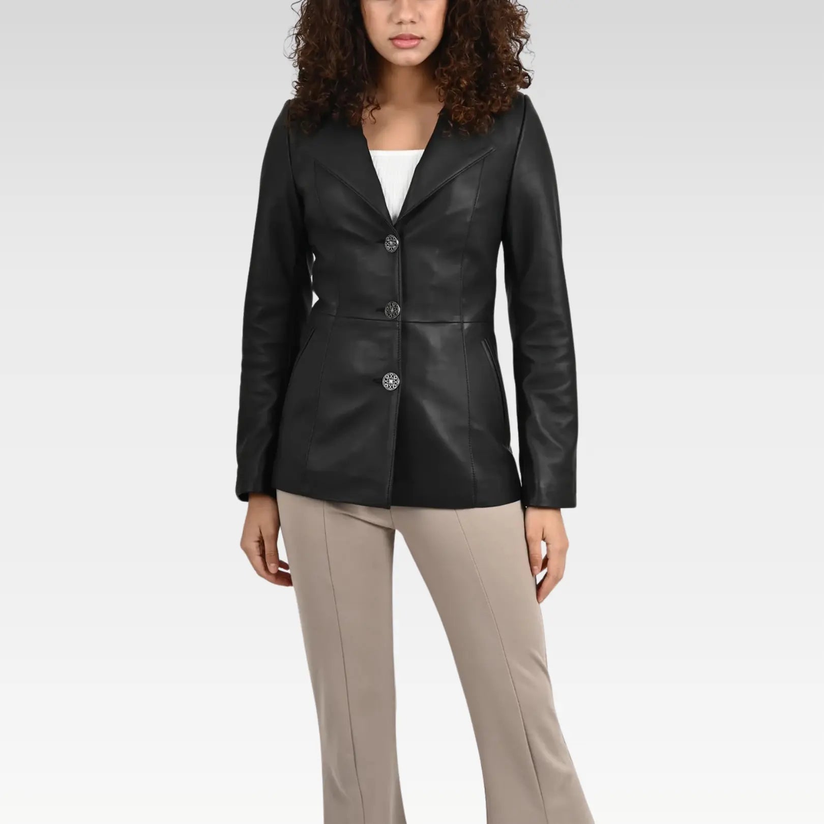 A stylish front view of a Brienne Casual Women's Black Leather Blazer, crafted from premium 100% genuine leather, featuring a classic lapel collar and sleek button-up front, perfect for professional and casual wear.