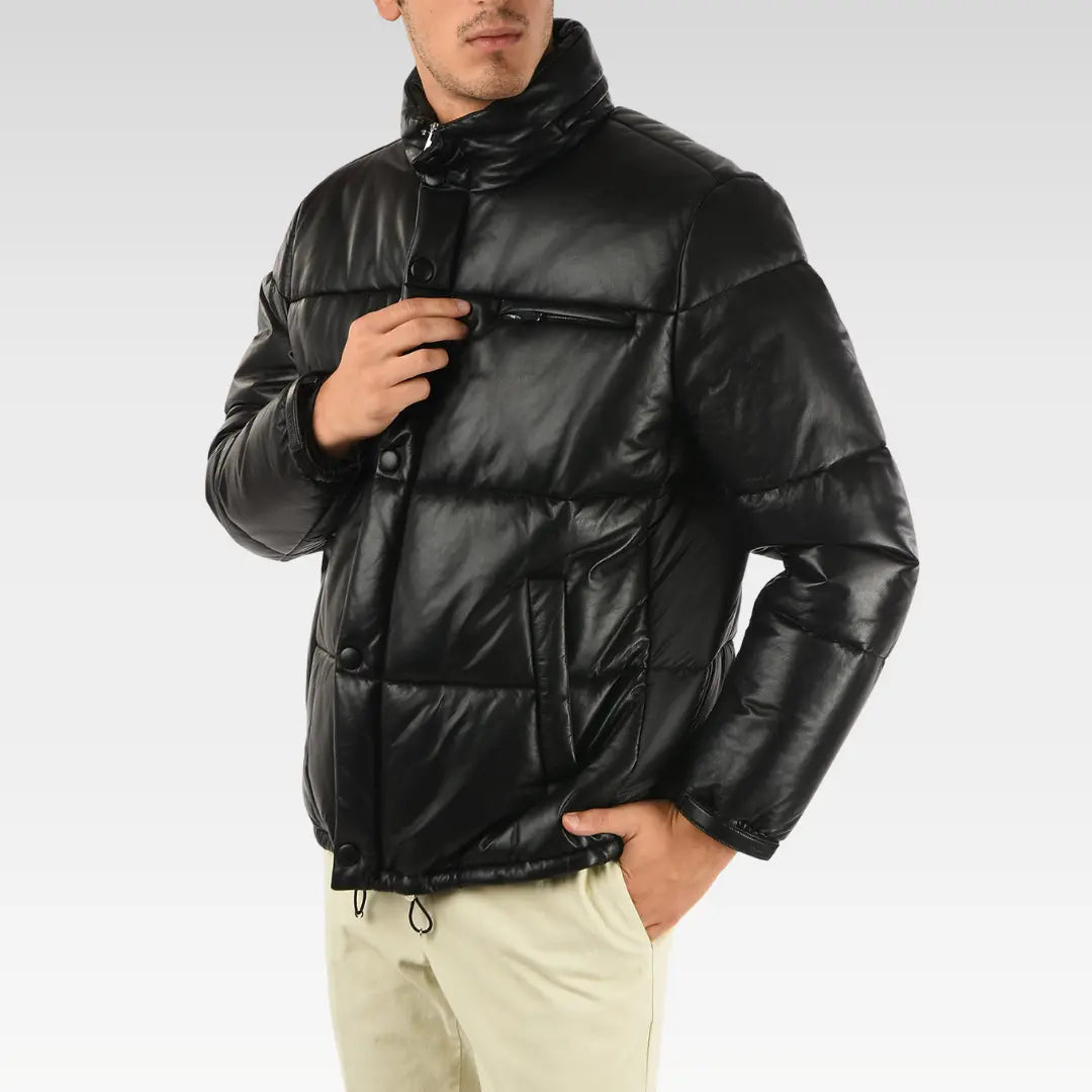 Side angle of Drexia Warm Quilted Back Leather Puffer Jacket in black, showing structured shoulders and modern quilted design