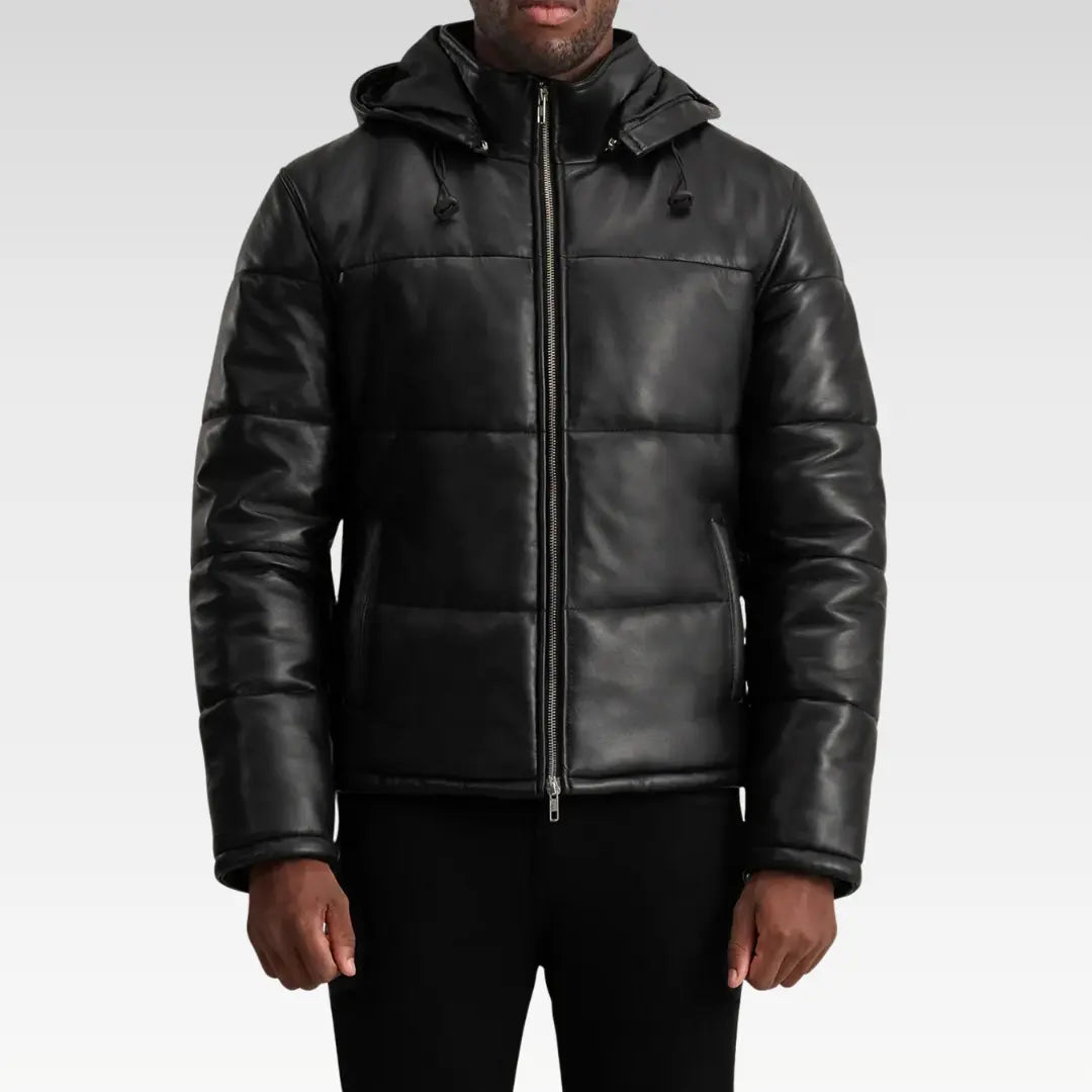 Front view of the Gordon Black Hooded Leather Puffer Jacket displaying its sleek silhouette, high-neck collar, and removable hood.
