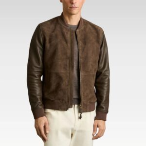 Man wearing a brown leather jacket on a plain background