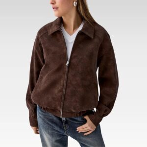 Model wearing Lyra oversized suede-finish jacket open at the front, styled with jeans and a white crop top for casual streetwear look.
