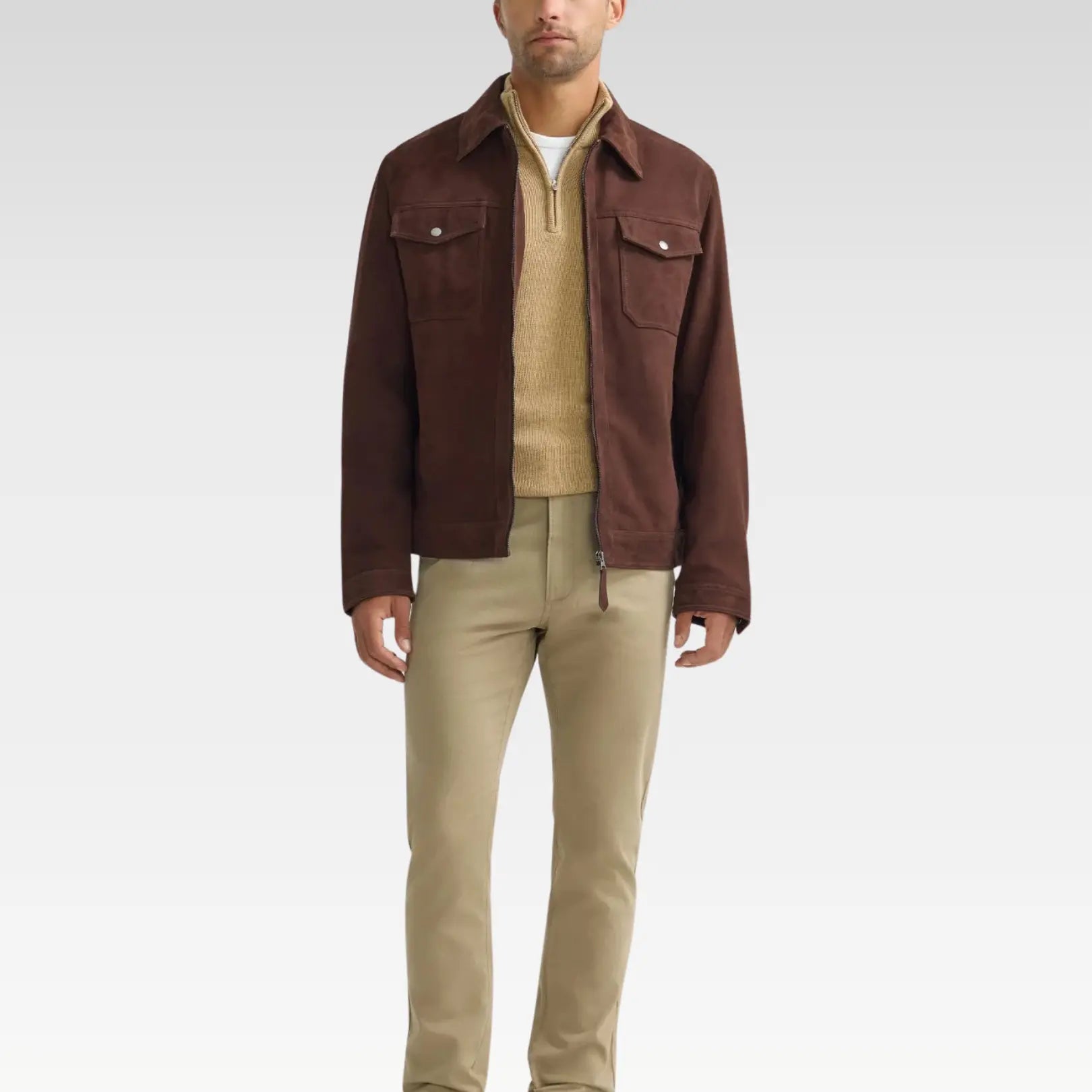 Front view of a brown trucker suede jacket with a sleek zip closure, genuine leather suede finish, regular fit, and chest pockets for a timeless, versatile style.
