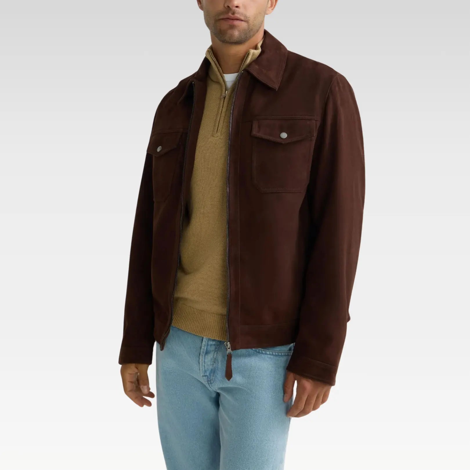 Side view of a brown trucker suede jacket showcasing sleeve buttons, genuine leather suede finish, regular fit, and side pockets for practical, all-season wear.