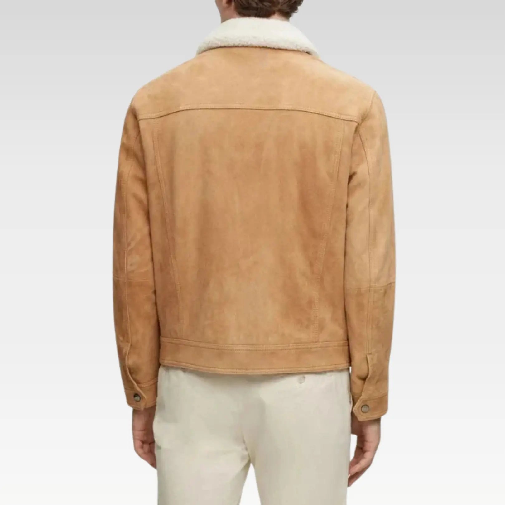 Back men shirt-style suede jacket in tan, crafted from genuine goat suede with a soft fur collar, showcasing a tailored fit and premium texture for a rugged yet sophisticated look