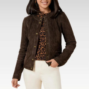 Front view of the Nira Quilted Sheepskin Suede Leather Jacket in rich brown genuine suede, featuring elegant quilting, central button closure, and tailored fit, paired with white pants.