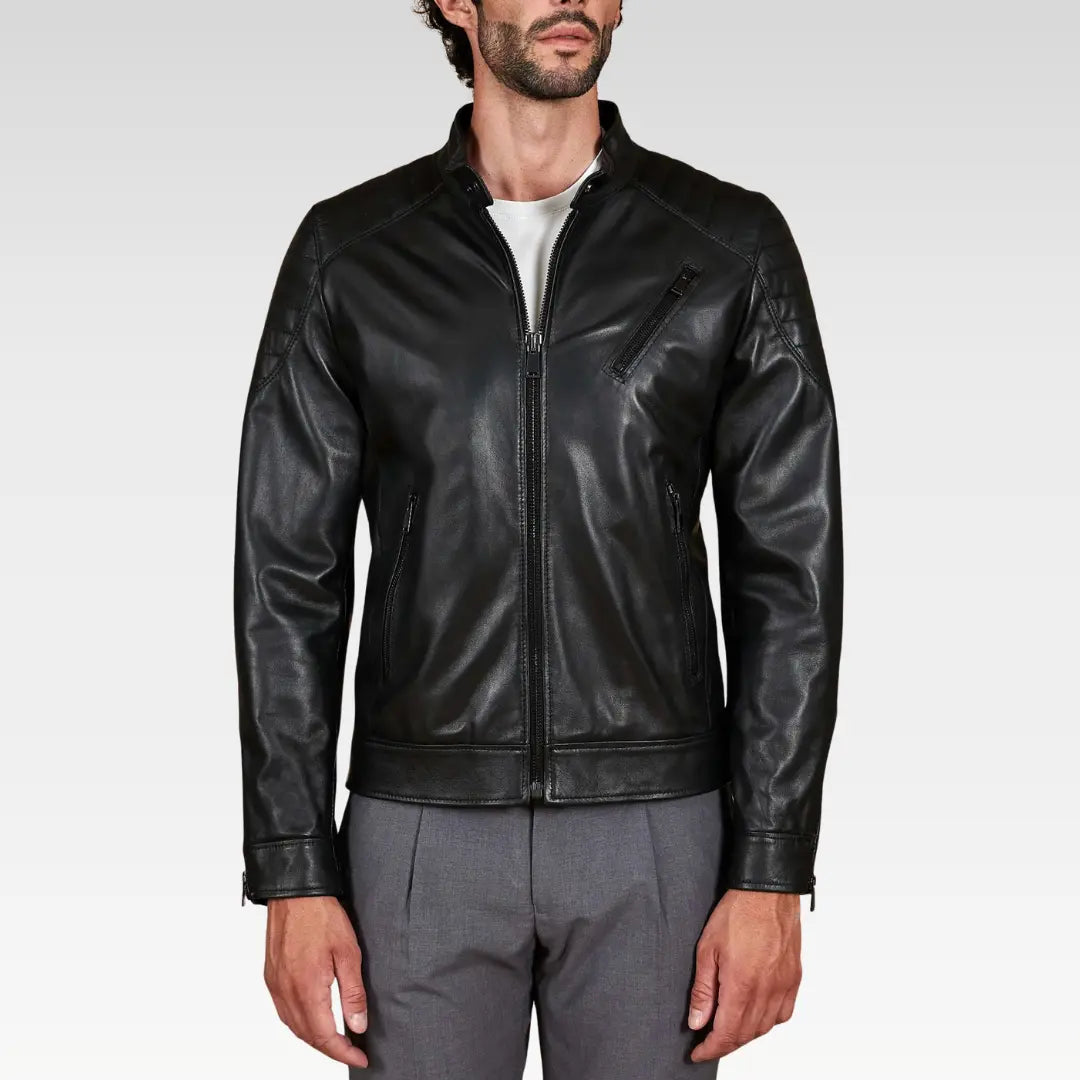 Close front view of the Oryn Black Quilted Lamb Leather Bomber Jacket showcasing quilted shoulder yoke and premium lamb leather texture.