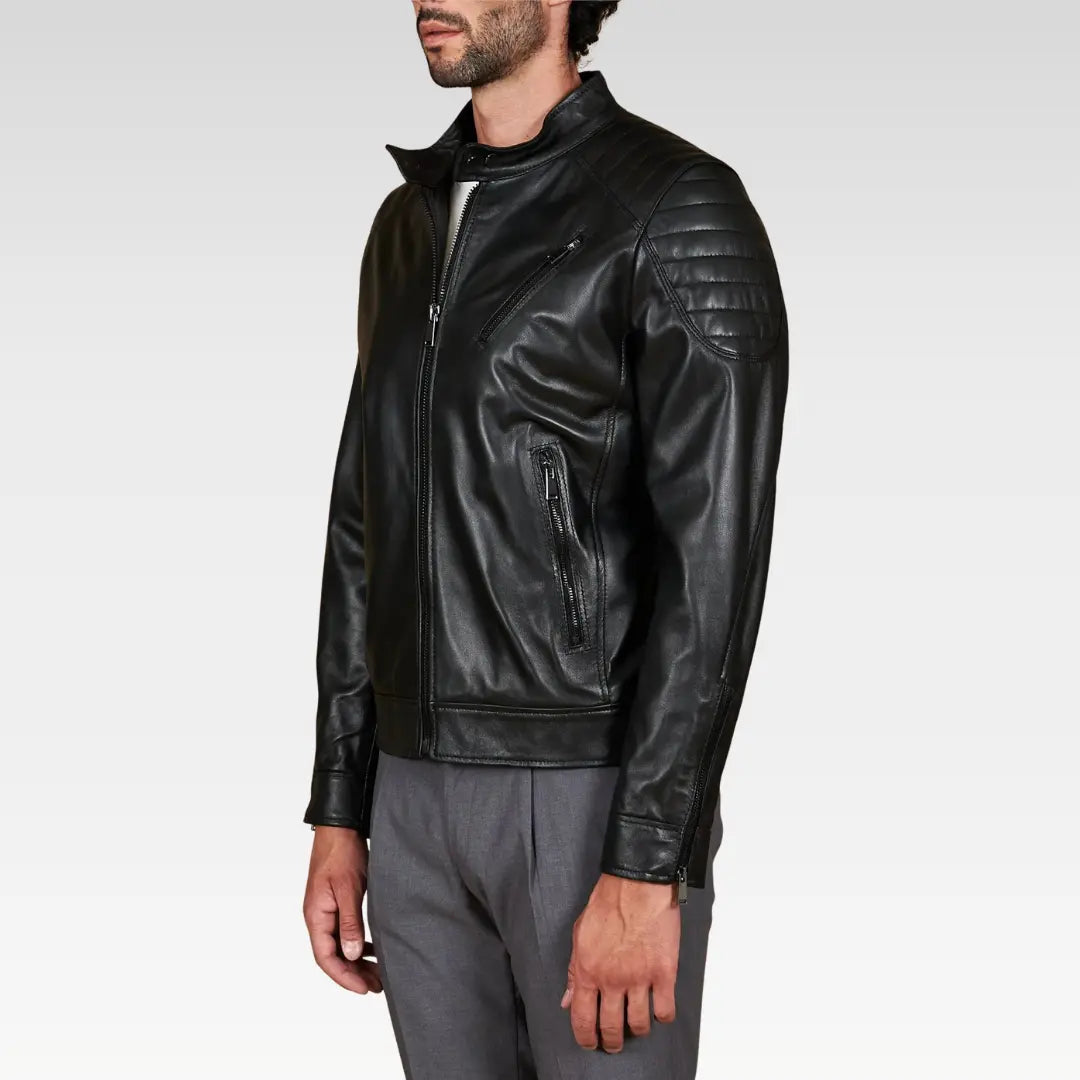 Side angle of the Oryn Black Quilted Lamb Leather Bomber Jacket displaying quilted shoulder detail, zipper sleeves, and sleek silhouette.