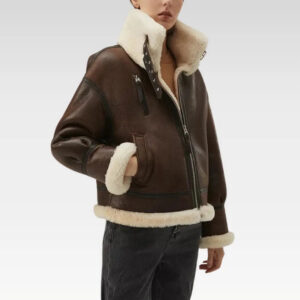 Front view of a women's dark brown leather faux shearling coat jacket, featuring a relaxed collared design and zip closure, ideal for a chic and warm winter outfit.