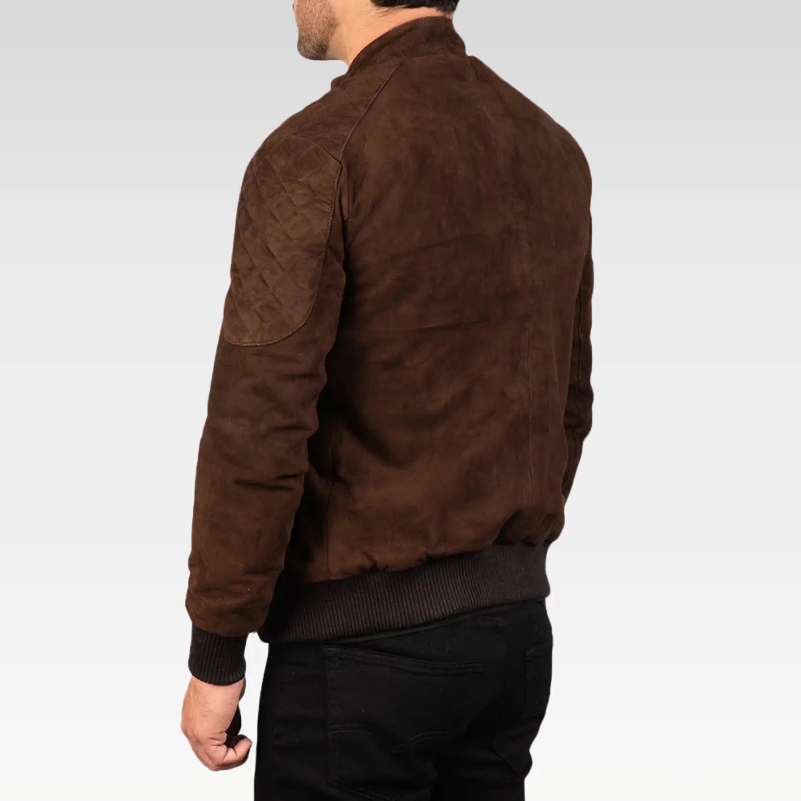 Back view of Zenith Mocha Suede Bomber Jacket in dark brown goatskin suede, highlighting clean lines, rib-knit hem, and structured bomber jacket .