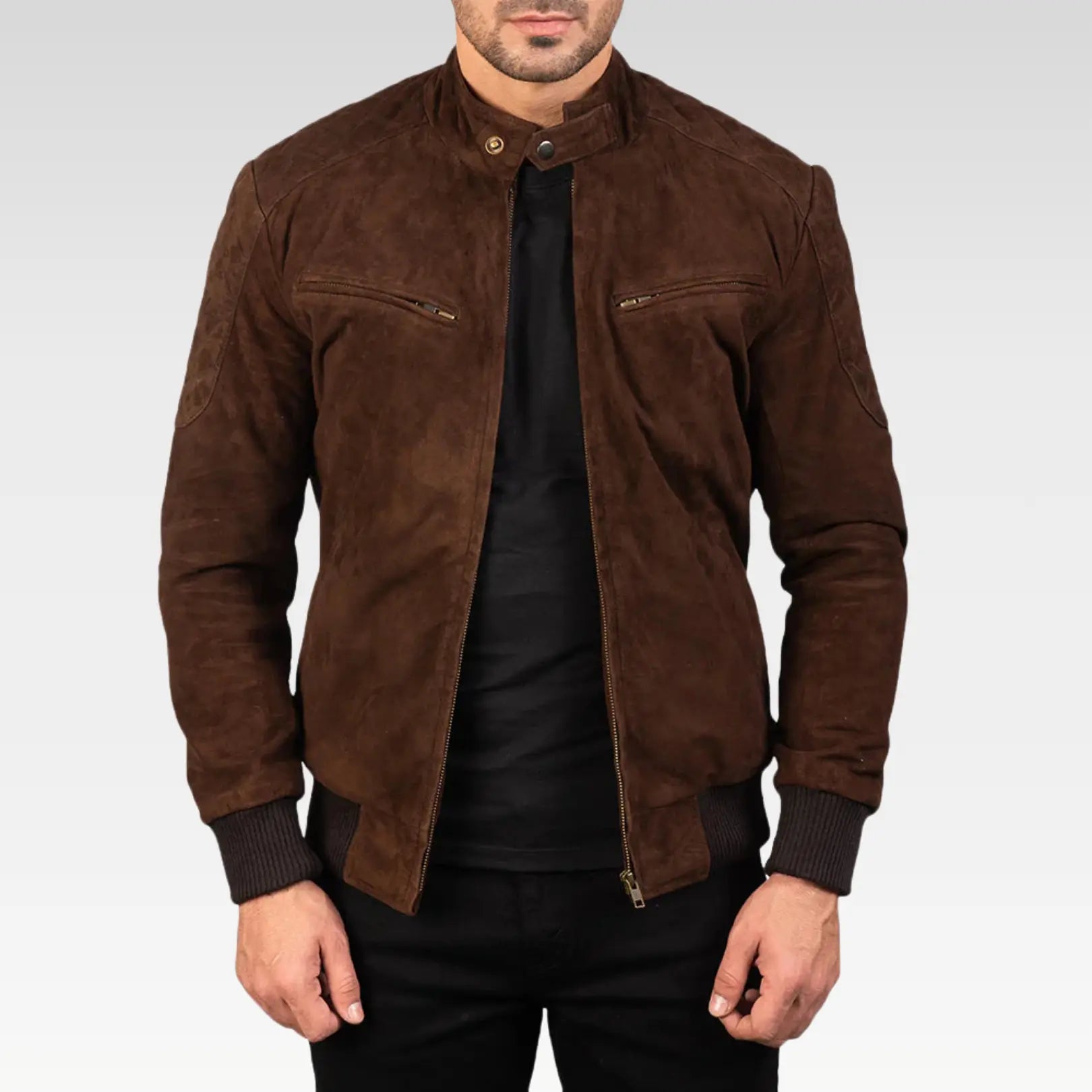 Front close-up of Zenith Mocha Suede Bomber Jacket in rich dark brown goatskin suede, showcasing rib-knit cuffs, snap button band collar, and functional exterior pockets.