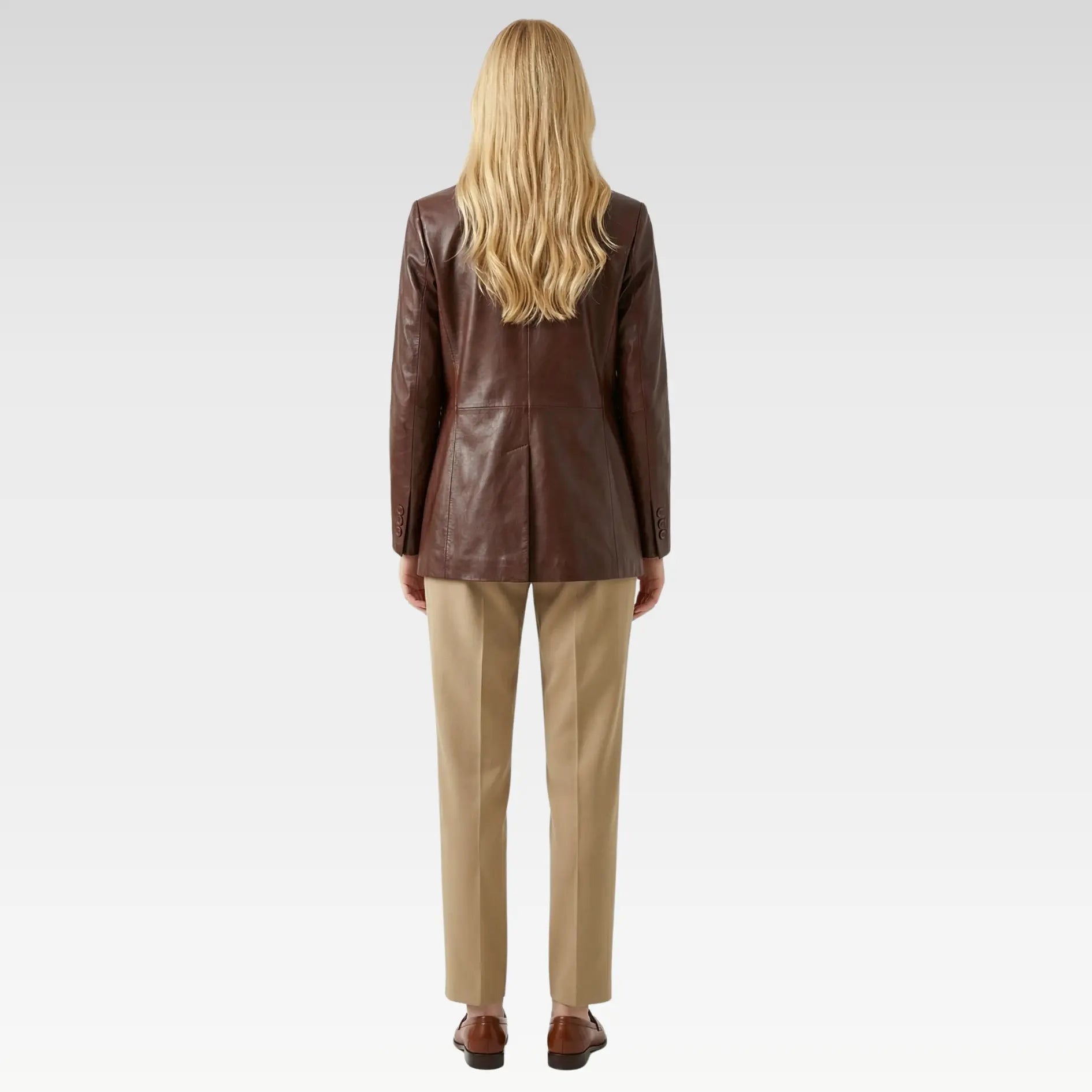 Back view of women’s brown genuine leather blazer